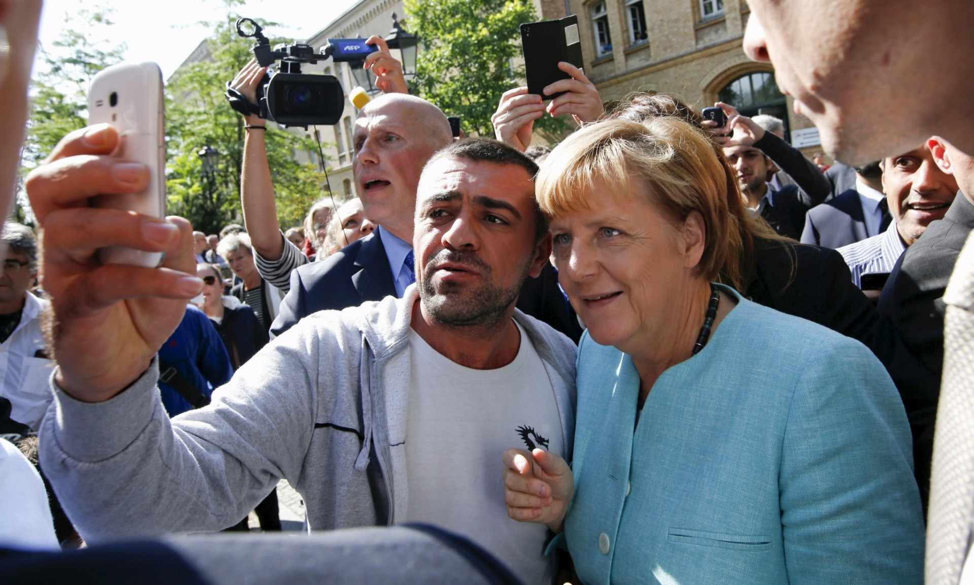 Migrant sa fotí s Merkelovou