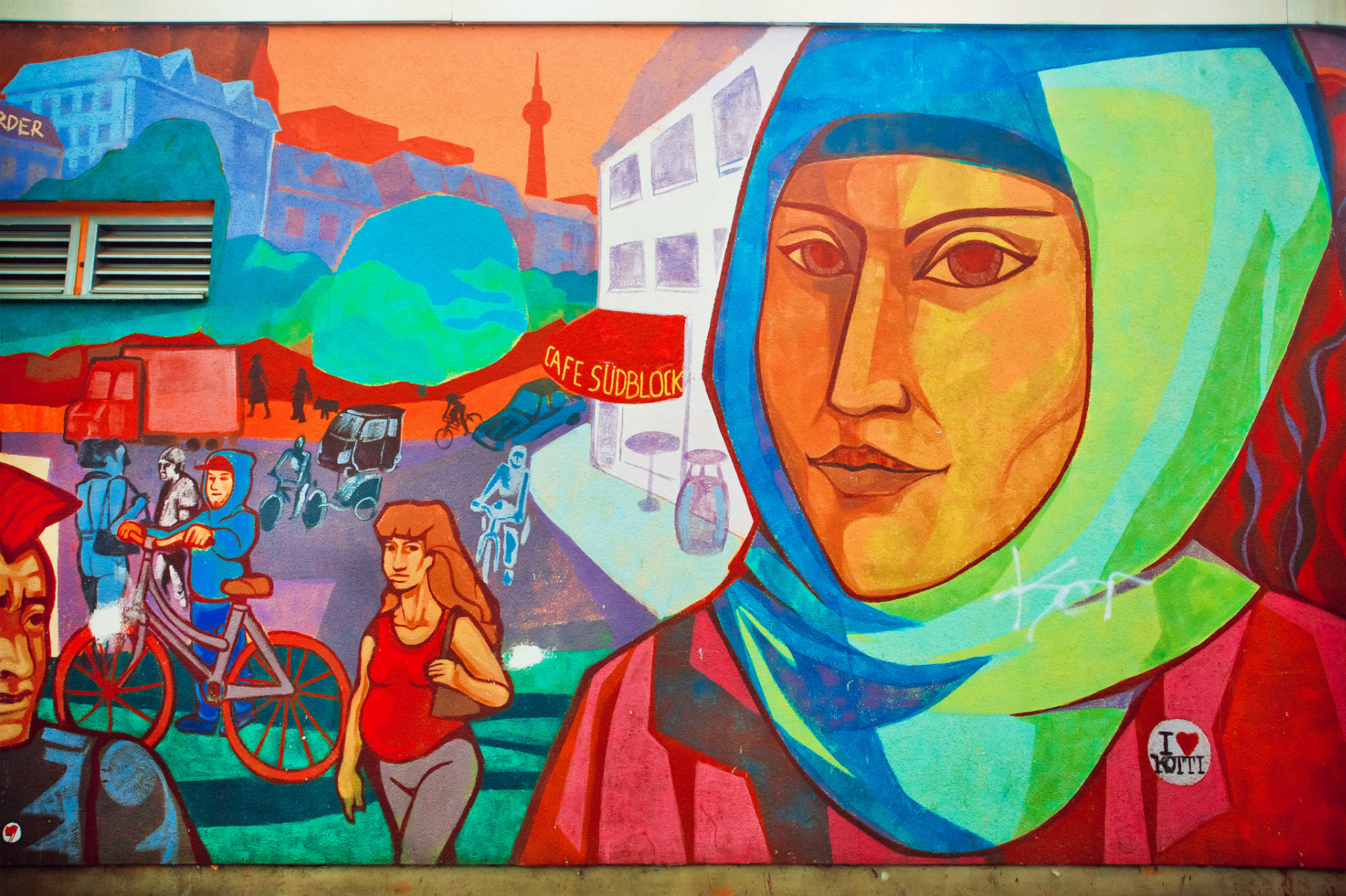 Mestské graffiti ženy v hidžábe v jednej zo štvrtí Berlína, kde žijú imigranti.