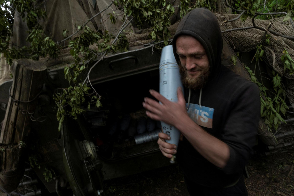 Príslušník ukrajinských ozbrojených síl v Doneckej oblasti. FOTO: REUTERS/Carlos Barria