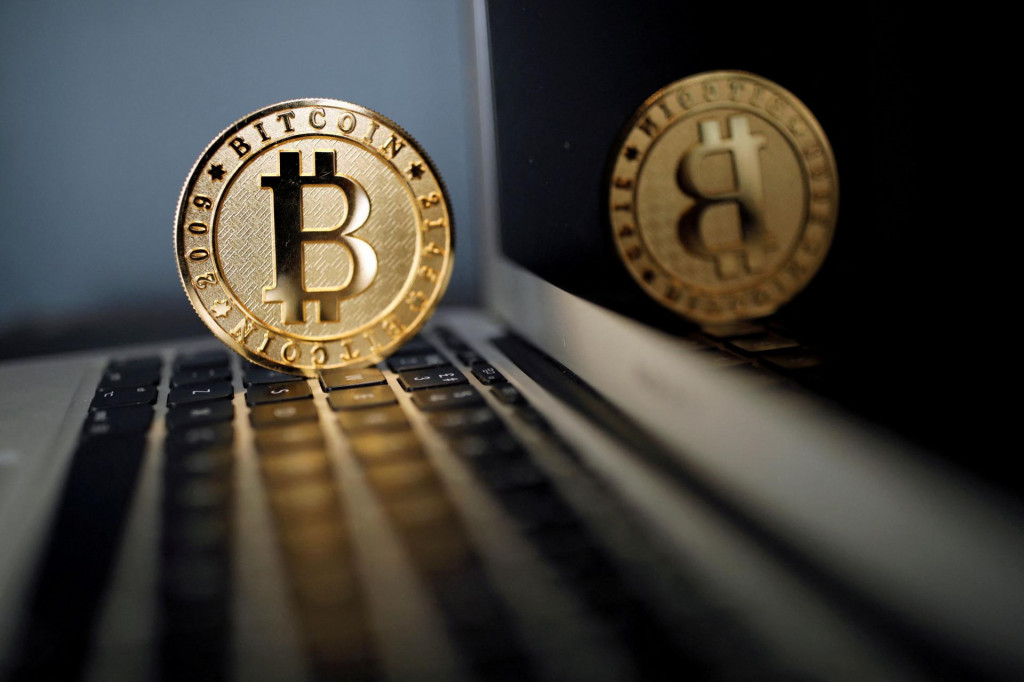 Bitcoin, symbol. FOTO: Reuters