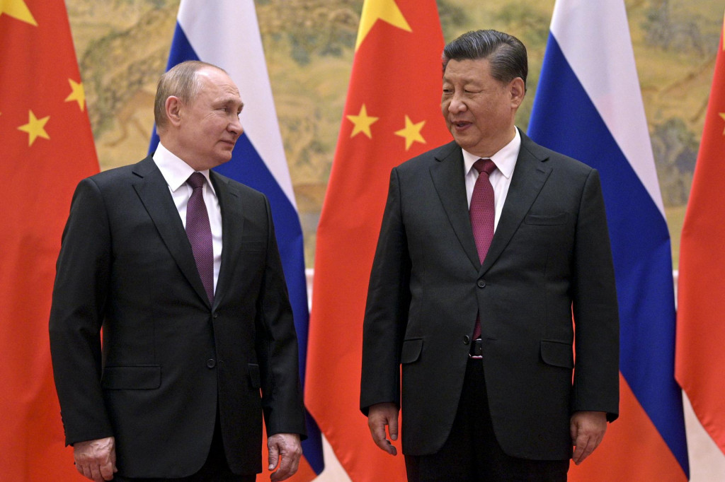 Čínsky prezident Si Ťin-pching a ruský prezident Vladimir Putin. FOTO: TASR/AP