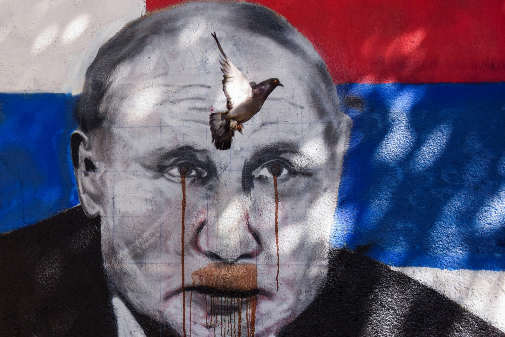 Posprejovaný obrázok ruského prezidenta Vladimira Putina. FOTO: Reuters