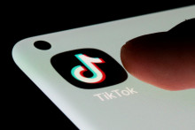 FILE PHOTO: TikTok app is seen on a smartphone in this illustration taken, July 13, 2021. REUTERS/Dado Ruvic/Illustration/File Photo