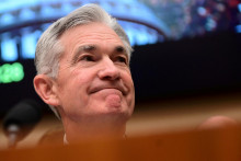 Šéf americkej centrálnej banky Jerome Powell a jeho záhadný úsmev. FOTO: Erin Scott