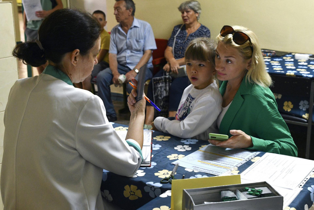 Fotografia ukrajinsk&yacute;ch civilistov v Z&aacute;porož&iacute;. FOTO: TASR/AP
