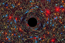 Tento počítačom simulovaný obrázok ukazuje supermasívnu čiernu dieru v jadre galaxie.