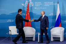 Ruský prezident Vladimir Putin a predstaviteľ Číny. FOTO: Reuters