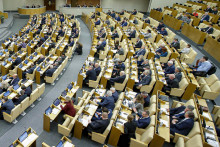 Ruskí poslanci počas zasadnutia Štátnej dumy, dolnej komory ruského parlamentu v Moskve. FOTO: TASR/AP