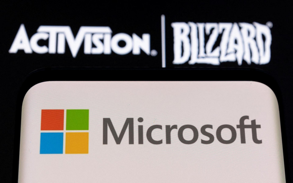 Microsoft a Activision Blizzard logá. FOTO: REUTERS