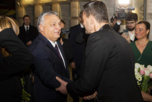 Na snímke zľava maďarský premiér Viktor Orbán a dočasne poverený premiér Slovenskej republiky Eduard Heger. FOTO: TASR/J. Kotian