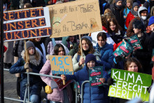 People hold placards as they take part in the Fridays for Future climate strike, ahead of the upcoming state elections, in Berlin, Germany, February 10, 2023. REUTERS/Fabrizio Bensch