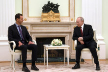 Ruský prezident Vladimir Putin (vpravo) a sýrky prezident Bašár Asad rokujú v Moskve. FOTO: TASR/AP
