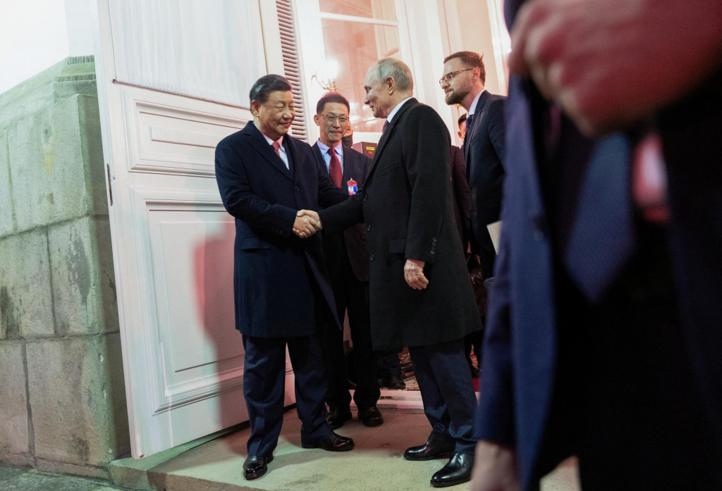 Ruský prezident Vladimir Putin a čínska prezident Si Ťin-pching. FOTO: Reuters