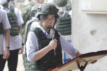 Taiwanská prezidentka Cchaj Jing-wen počas prejavu v rámci kontroly výcviku armádnych záložníkov v Tao-Juane na severe Taiwanu. FOTO: TASR/AP