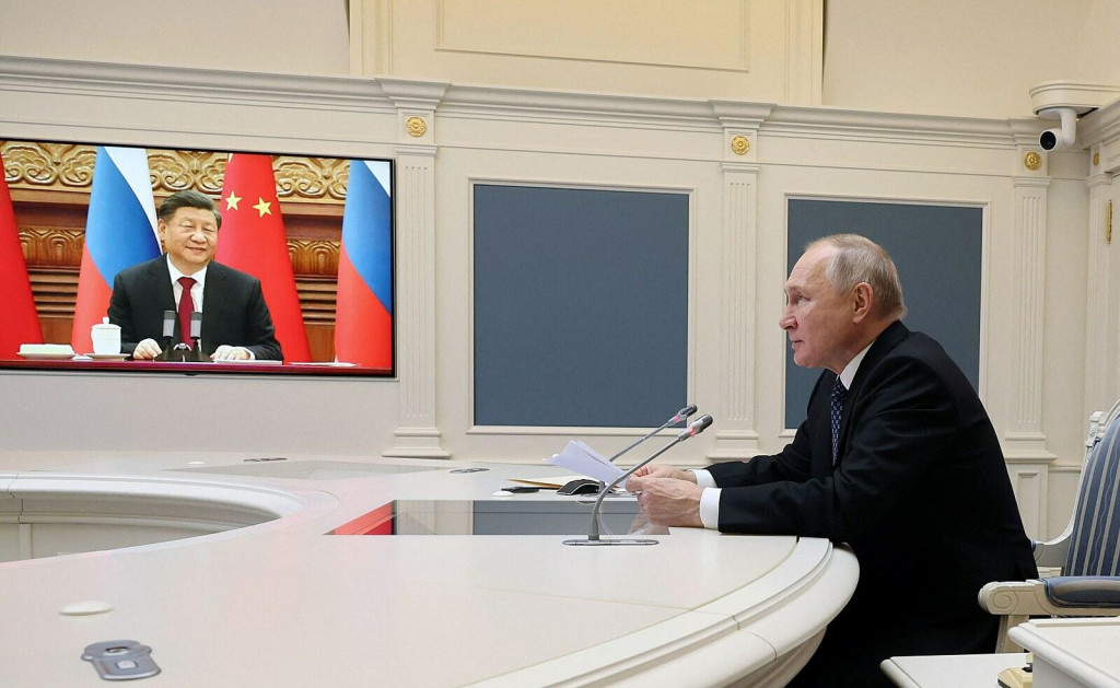 Ruský prezident Vladimir Putin rokuje so svojím čínskym náprotivkom Si Ťin-pchingom. (30. decembra 2022) FOTO: Reuters