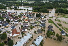 Zaplavená oblasť v obci Sneberje neďaleko slovinského mesta Kamnik. FOTO: TASR/AP