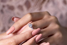 Diamond engagement ring on hand