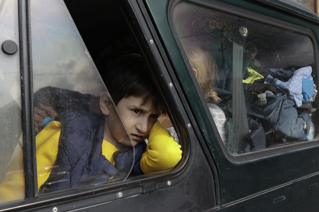 Z Náhorného Karabachu odchádzajú tisíce ľudí. FOTO: TASR/AP

