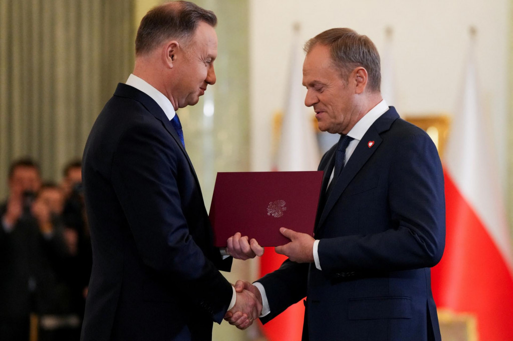 Poľský premiér Donald Tusk na slávnostnej prísahe vlády v Prezidentskom paláci vo Varšave. FOTO: Reuters