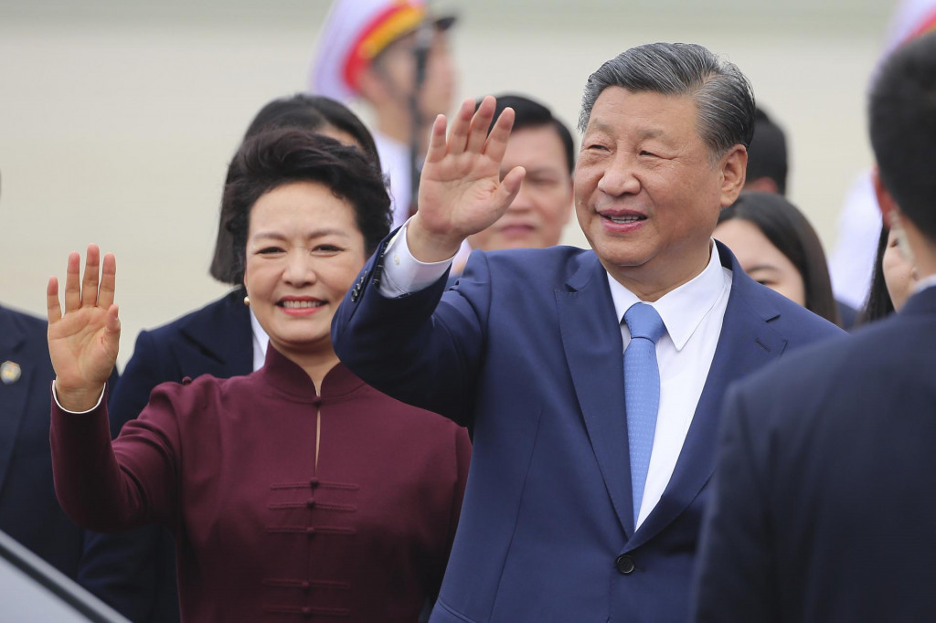 Čínsky prezident Si Ťin-pching (vpravo) a jeho manželka Peng Liyuan. FOTO: TASR/AP