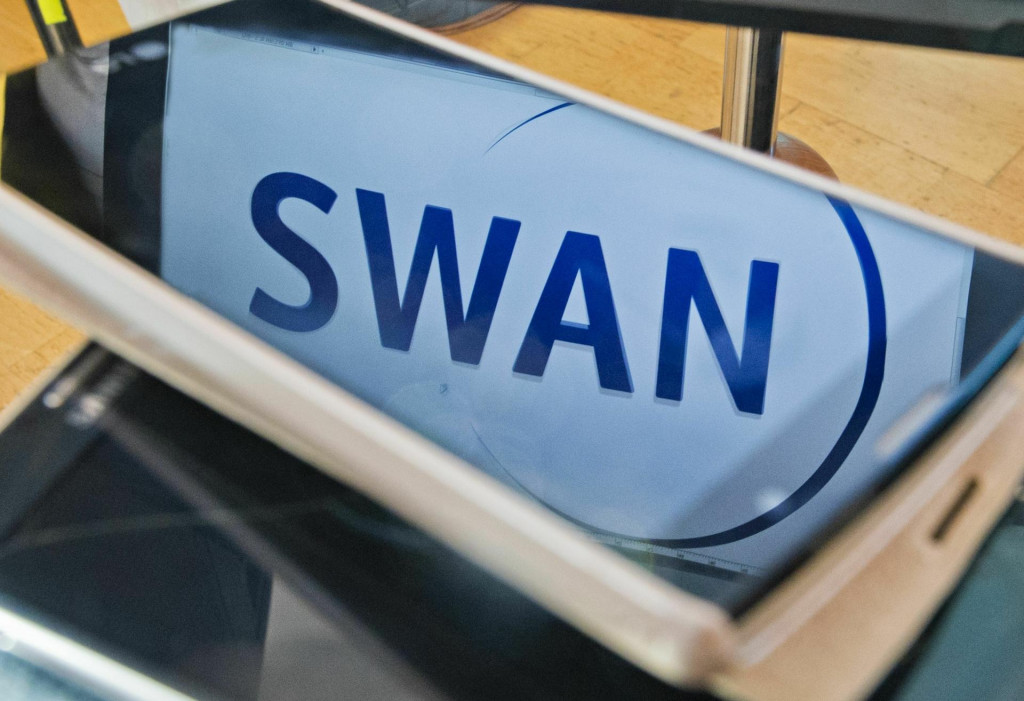 Logo telekomunikačnej spoločnosti Swan. FOTO: TASR/Martin Baumann