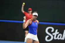 Slovenská tenistka Renáta Jamrichová sa raduje v zápase proti slovinskej tenistke Veronike Erjavečovej. FOTO: TASR/Pavel Neubauer
