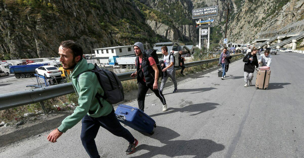 Rusi utekaúci do Gruzínska. FOTO: Reuters