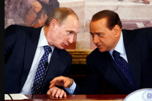 Vladimir Putin a Silvio Berlusconi. FOTO: Reuters