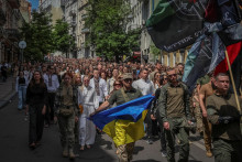 Pohrebný obrad v Kyjeve ukrajinskej dobrovoľnej zdravotníčky a novinárky Iryny Cybuchovej. FOTO. Reuters