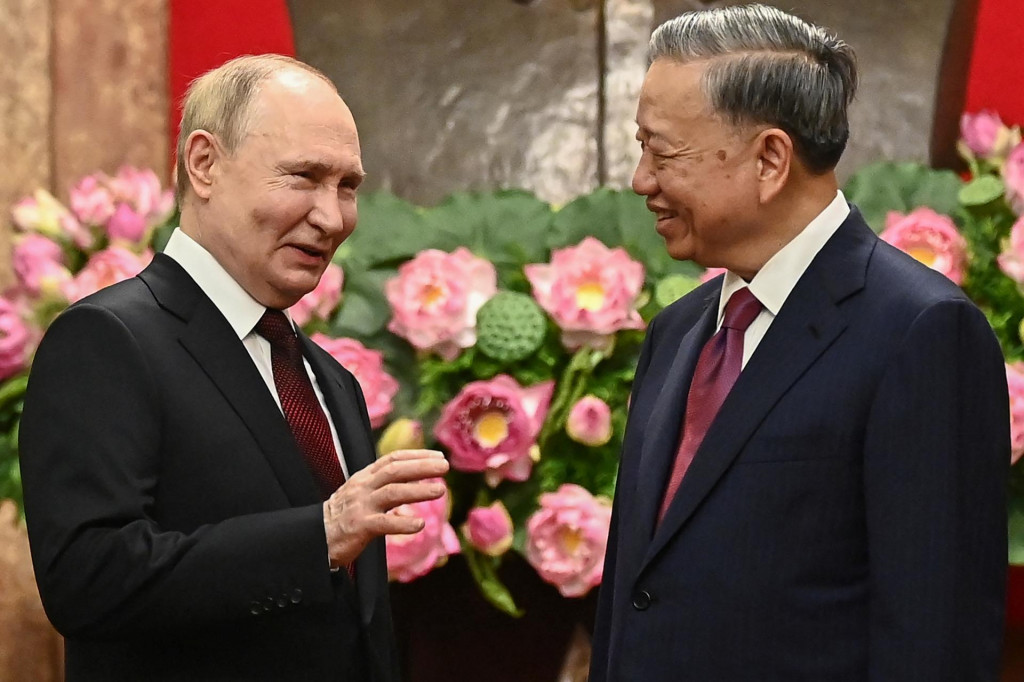 Ruský prezident Vladimir Putin s vietnamským prezidentom To Lamom. FOTO: Reuters