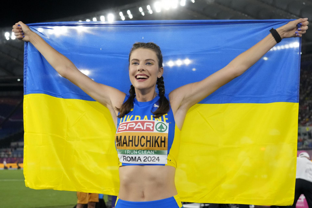 Ukrajinka Jaroslava Mahučichová sa raduje po zisku zlatej medaily v skoku do výšky na ME v Ríme v nedeľu 9. júna 2024. FOTO: TASR/AP