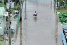 Zaplavená ulica v dôsledku silného dažďa v juhokórejskom Тägu. FOTO: Reuters/Yonhap