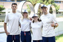 Slovenskí vodní slalomári, zľava Matej Beňuš, Eliška Mintálová, Zuzana Paňková a Jakub Grigar pózujú pred odchodom na letnú olympiádu. FOTO: TASR/Pavel Neubauer
