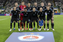 Futbalisti základnej jedenástky ŠK Slovan Bratislava pózujú pred zápasom 1. kola ligovej fázy Ligy majstrov Celtic Glasgow - ŠK Slovan Bratislava. FOTO: TASR/Martin Baumann