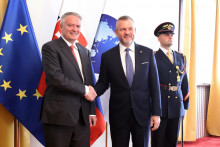 Generálny tajomník OECD Mathias Cormann a prezident Peter Pellegrini počas prijatia v Banskej Bystrici. FOTO: TASR/Ján Krošlák