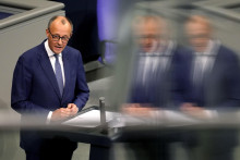 Líder nemeckej opozičnej Kresťanskodemokratickej únie Nemecka Friedrich Merz počas vyhlásenia v nemeckom parlamente Bundestag v Berlíne. FOTO: TASR/AP