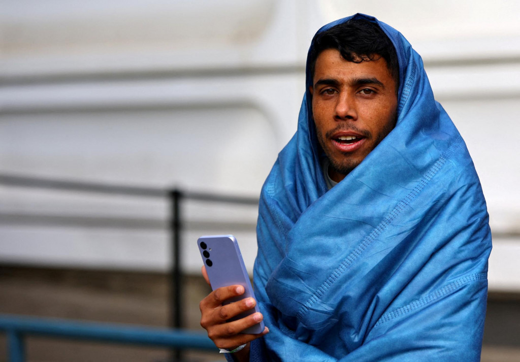 Migrant zo Sýrie v Nemecku. FOTO: Reuters