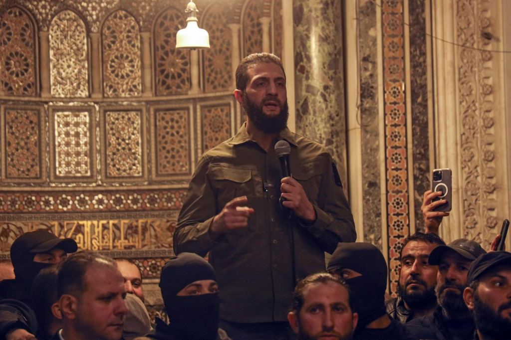 Na snímke terajší vodca povstalcov z Organizácie pre oslobodenie Levanty (Hajat Tahrír aš-Šám) Ahmad Husajn Šara. FOTO: TASR/AP