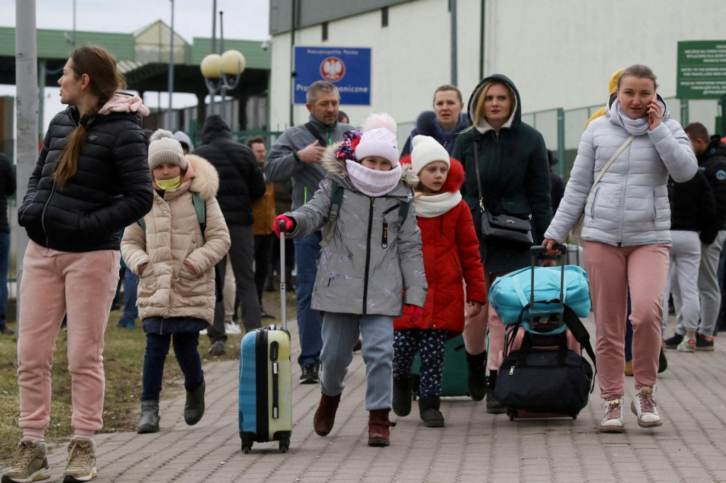 Utečenci z Ukrajiny. FOTO: Reuters