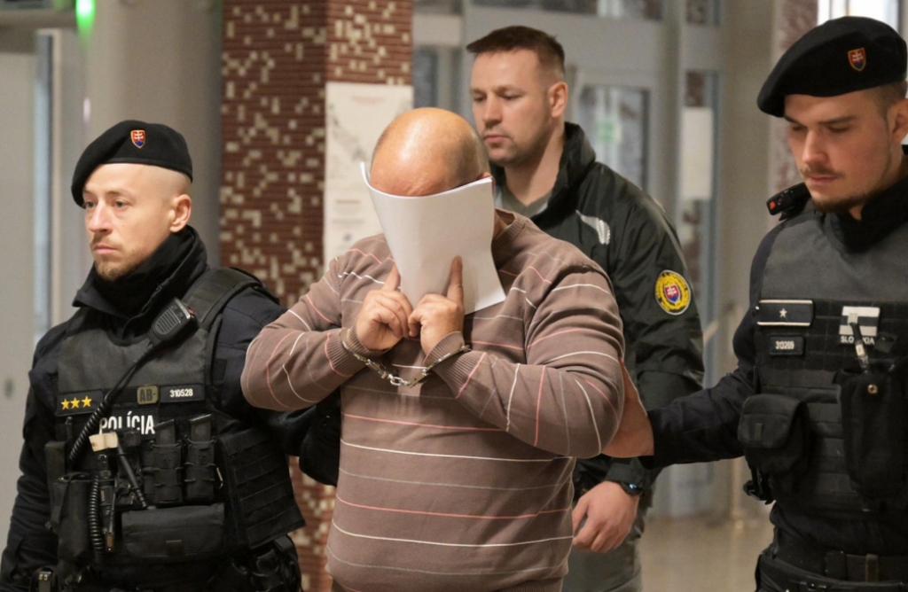 Na snímke obvinený policajt na Mestskom súde v Košiciach. FOTO: TASR/František Iván