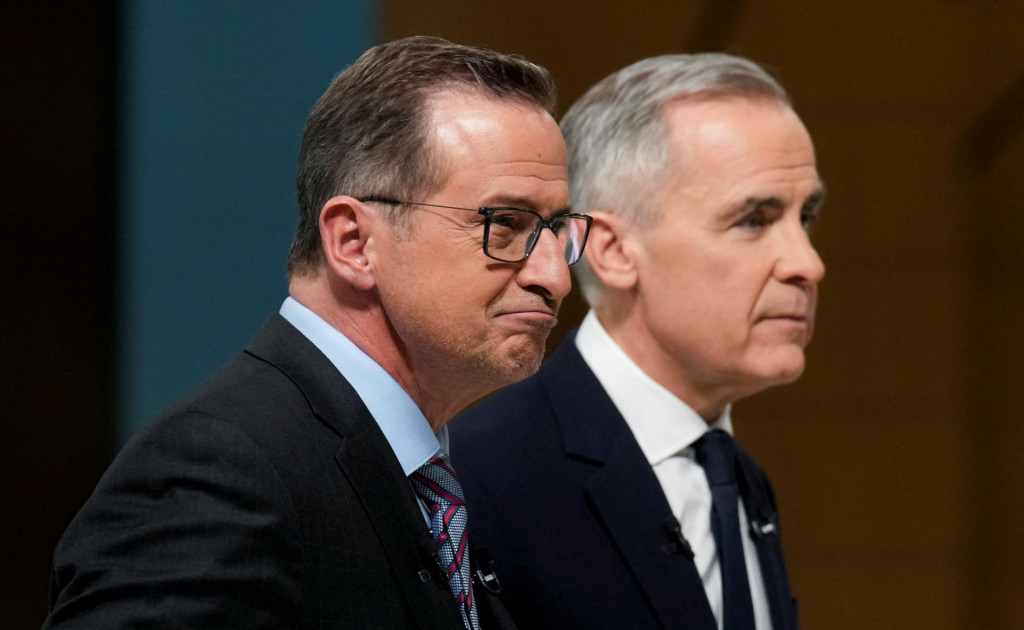 Líder bloku Quebecois Yves-Francois Blanchet a líder liberálov Mark Carney. FOTO: Reuters