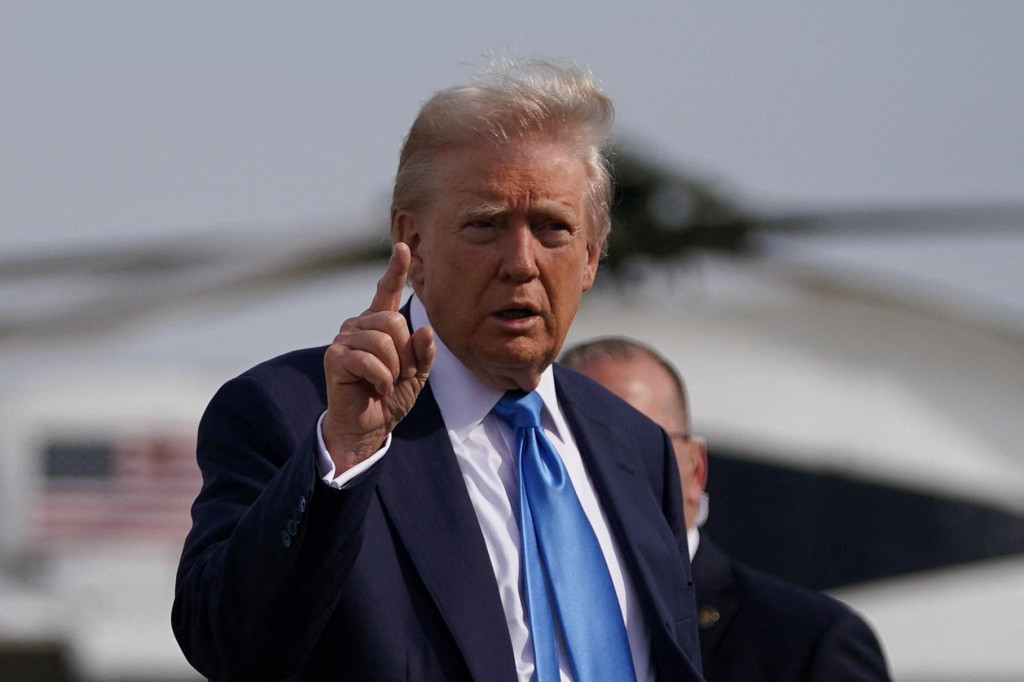 Americký prezident Donald Trump forsíruje nekompromisnú obchodnú politiku brutálnych ciel s celým svetom. Aj preto jarná ekonomická prognóza MMF potemnela. FOTO: REUTERS