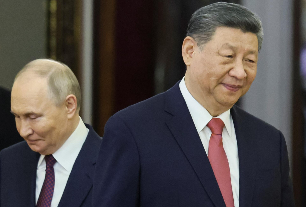 Ruský prezident Vladimir Putin a čínsky prezident Si Ťin-pching na stretnutí v Moskve. FOTO: REUTERS