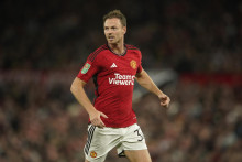 Manchester United zostáva jednoznačne najhodnotnejším a najznámejším verejne obchodovaným futbalovým klubom na newyorskej burze. FOTO TASR/AP


