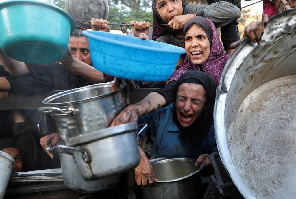 Palestínčania v Pásme Gazy. FOTO: Reuters