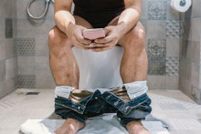 Phone on the toilet
