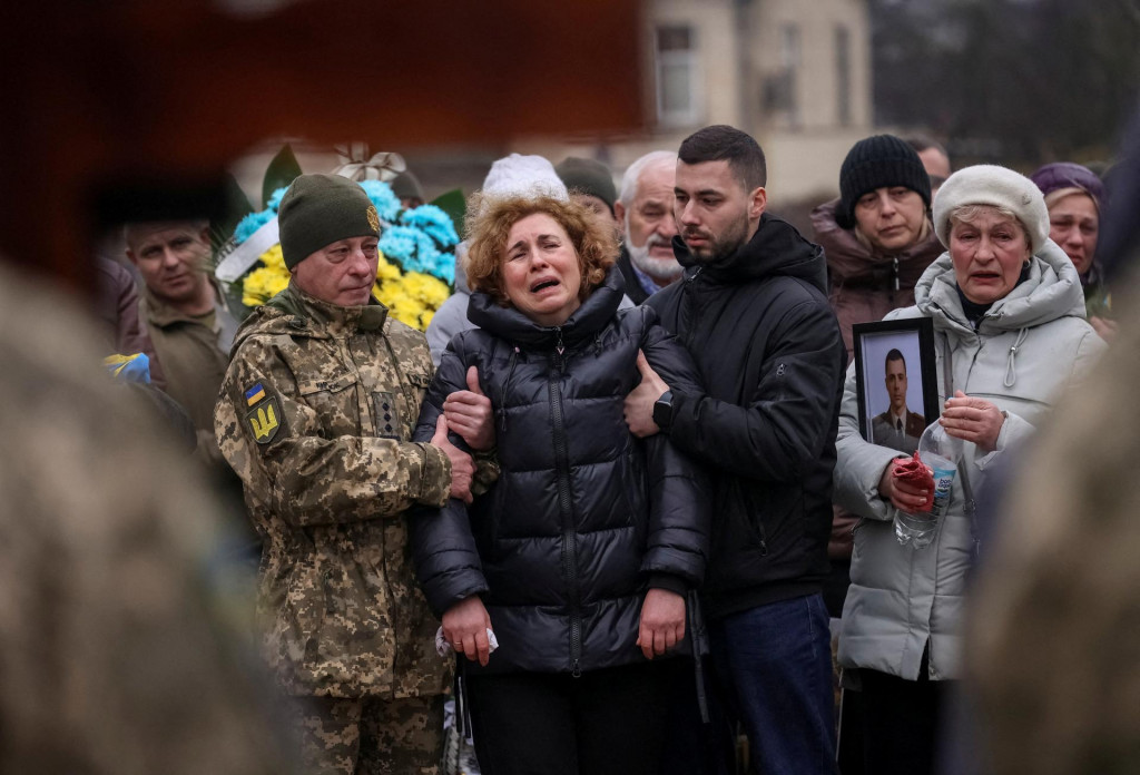 Pohreb v Ľvove. FOTO: REUTERS