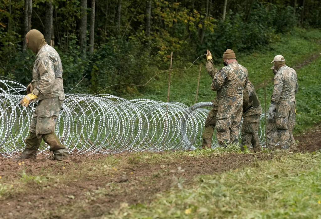 Vojaci arm&aacute;dy Litvy. FOTO: Reuters