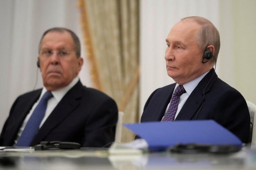 Rusk&yacute; prezident Vladimir Putin a rusk&yacute; minister zahraničn&yacute;ch vec&iacute; Sergej Lavrov. FOTO: Reuters