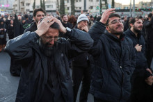 People react as they gather at the Enghelab Square, after Iran&lsquo;s Supreme Leader Ayatollah Ali Khamenei was killed in Israeli and U.S. strikes on Saturday, in Tehran, Iran, March 1, 2026. Majid Asgaripour/WANA (West Asia News Agency) via REUTERS ATTENTION EDITORS - THIS PICTURE WAS PROVIDED BY A THIRD PARTY TPX IMAGES OF THE DAY FOTO: Majid Asgaripour
